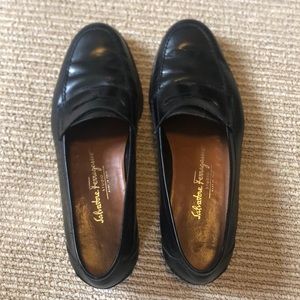 Men’s Salvatore Ferragamo black penny loafers